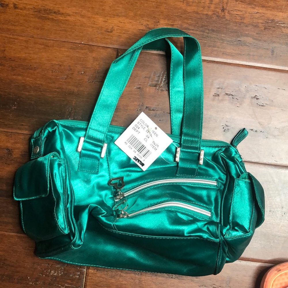 Green new with tags purse